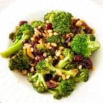 A bowl with sautéed broccoli in garlic.
