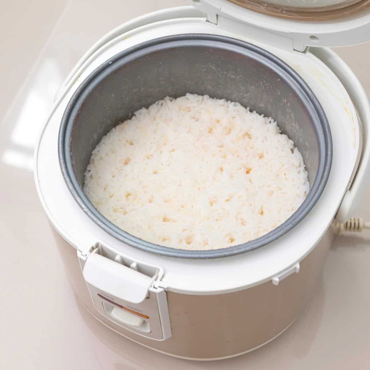 Long grain rice in the rice cooker.