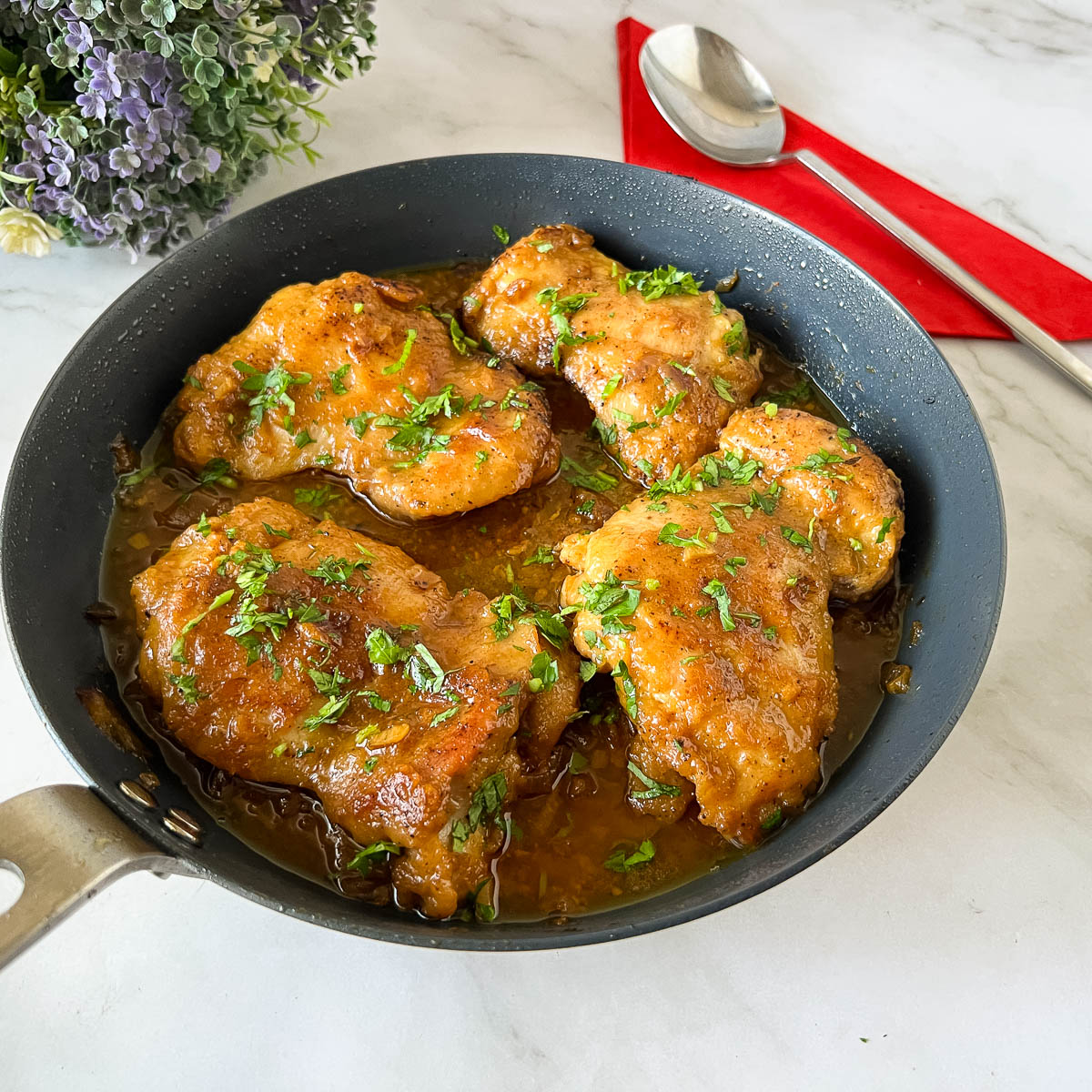 A skillet chicken with honey mustard glazed chicken.