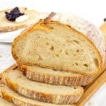 A sliced sourdough loaf on the plate.