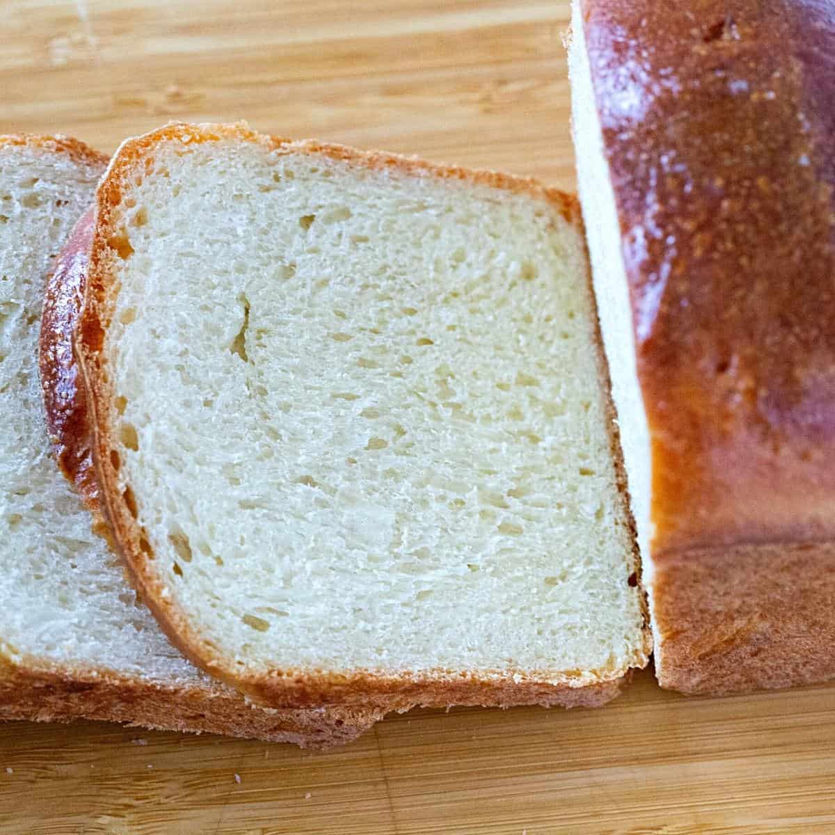 A slice of sourdough bread on the wooden board.