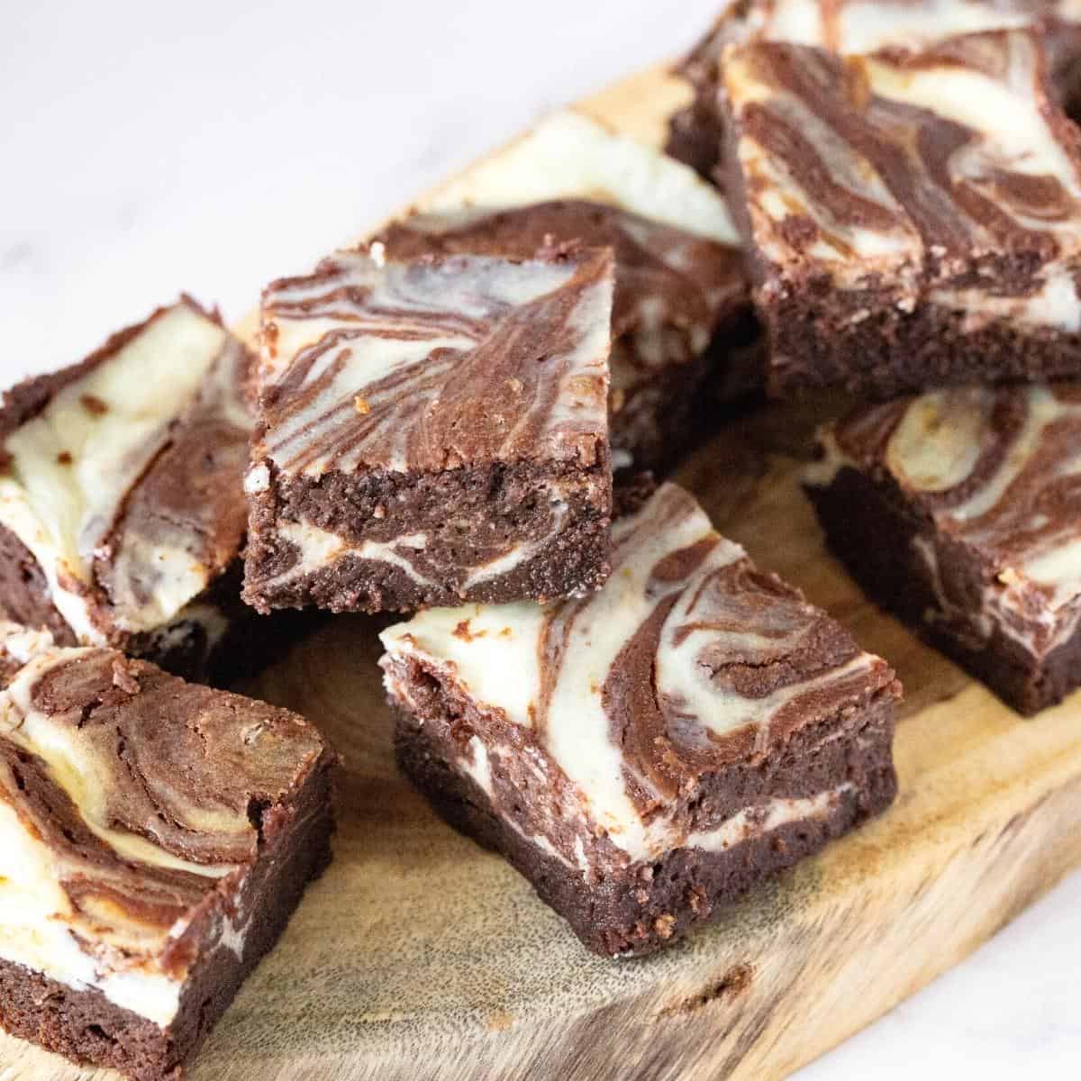 Brownies sliced with cream cheese.