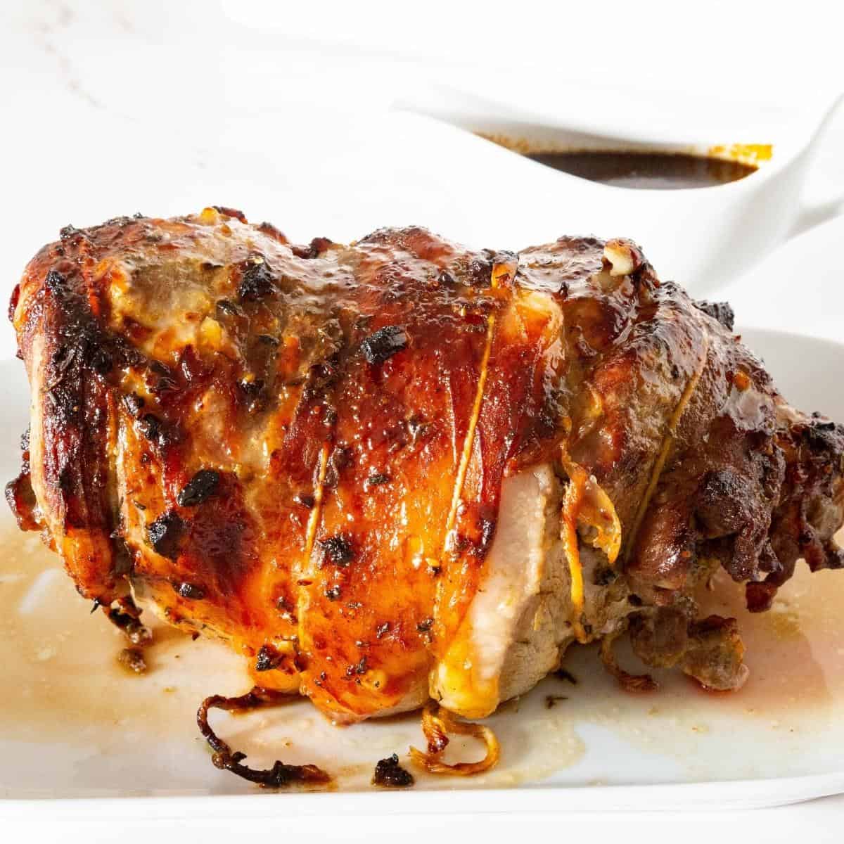 A lamb roast on the platter.