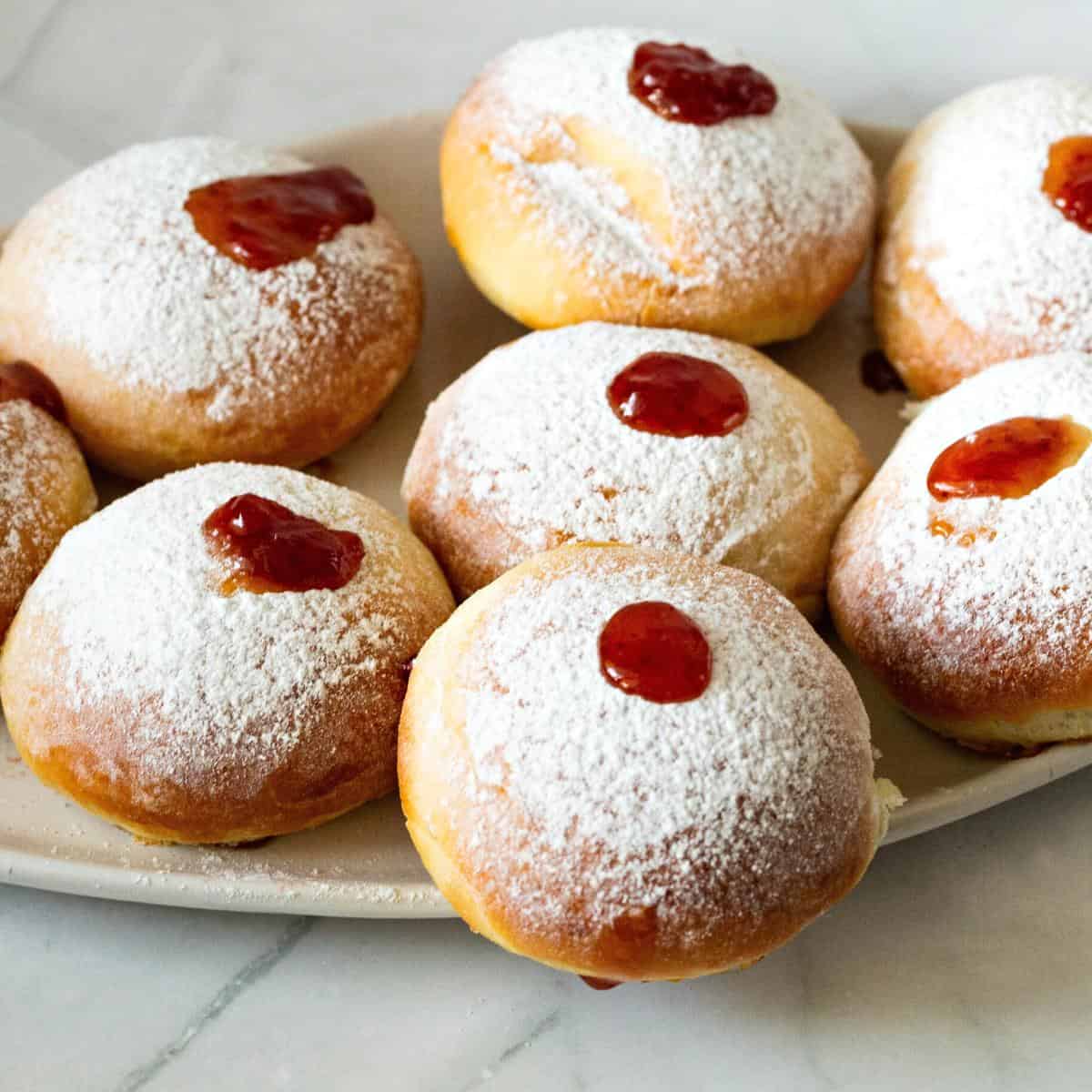 Jam donuts on the platter.
