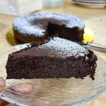 A slice of cake flourless torte on a plate.