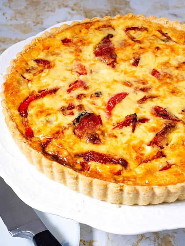 Homemade quiche with artichoke red peppers