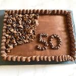 Chocolate sheet cake on the cake board.