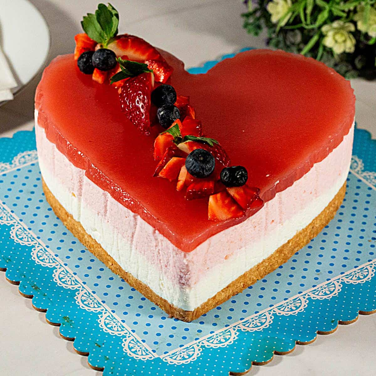 A heart cake on the board.
