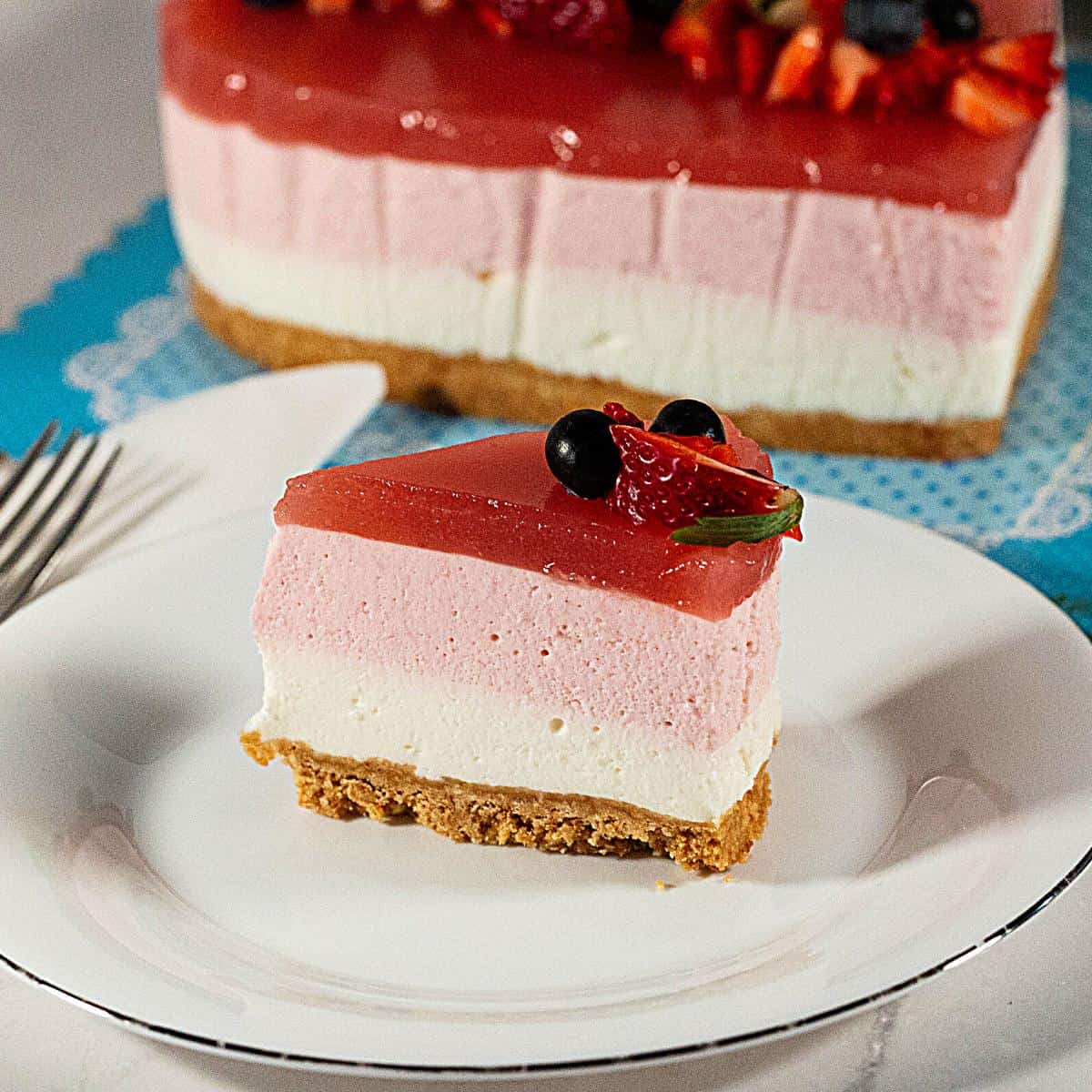 A slice of cream cheese mousse cake.