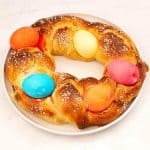 Braided bread with colored eggs.