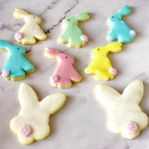 Colorful Frosted Easter Bunny Sugar Cookies on the table.