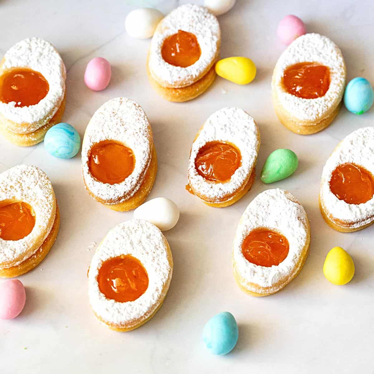 Egg shaped cookies with apricot jam.