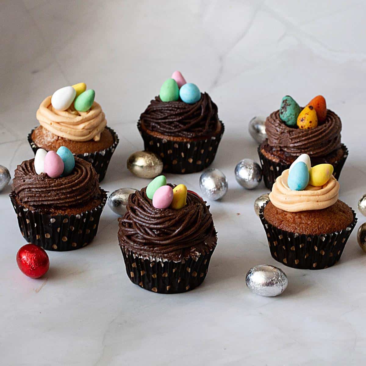 Frosted cupcakes with Easter Nests.