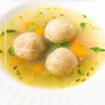 Pinterest image for making soup with matzo balls.