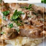 Pinterest image for sausage sautéed in a creamy mushroom gravy.