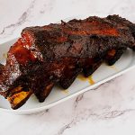 A platter with beef ribs.