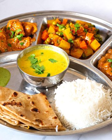 A thali with Indian dishes.