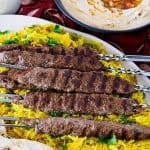 Kofta kebabs with pita and hummus.