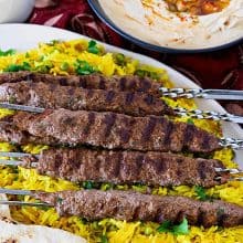 Kofta kebabs with pita and hummus.