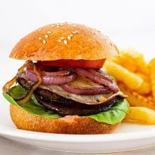 A burger with grilled portobello mushrooms.