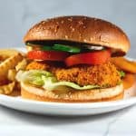 A sesame bun with Crispy Chicken.