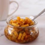 A jar with apple pie filling.
