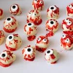 Cake Balls decorated for Halloween on the table.