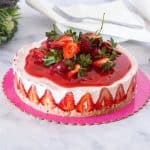 A whole cheesecake on the table.