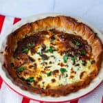 A baked phyllo pie in pie dish.
