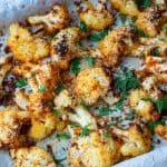 Spiced baked cauliflower in a sheet pan.