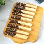 Shortbread chocolate coated sticks on the table.
