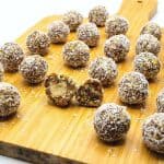 Board with almond butter stuffed date balls.