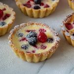 Cheesecake tarts on the table.