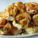 A tray with Feta and Olive Rolls.