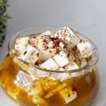 Marinated feta cheese in a mason jar.