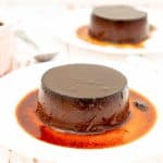 An inverted creme chocolate caramel on the plate.