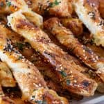 Pinterest image for Roasted Garlic Parmesan Puff Pastry Twist.