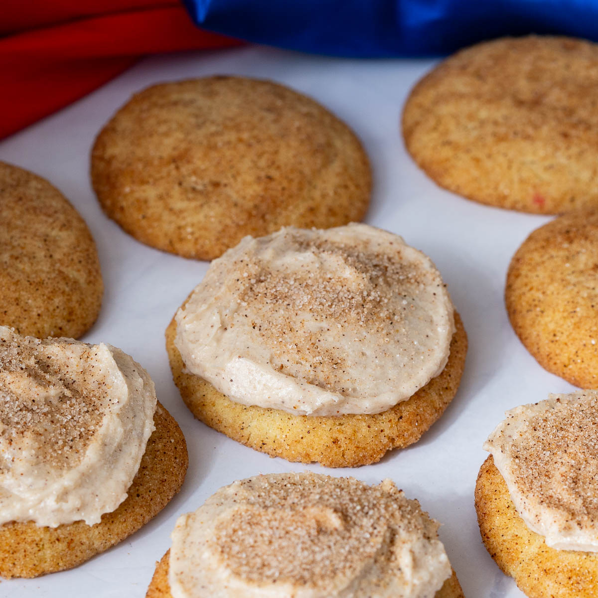 Frosted cookies on the table.