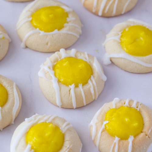 A table with lemon curd cookies.