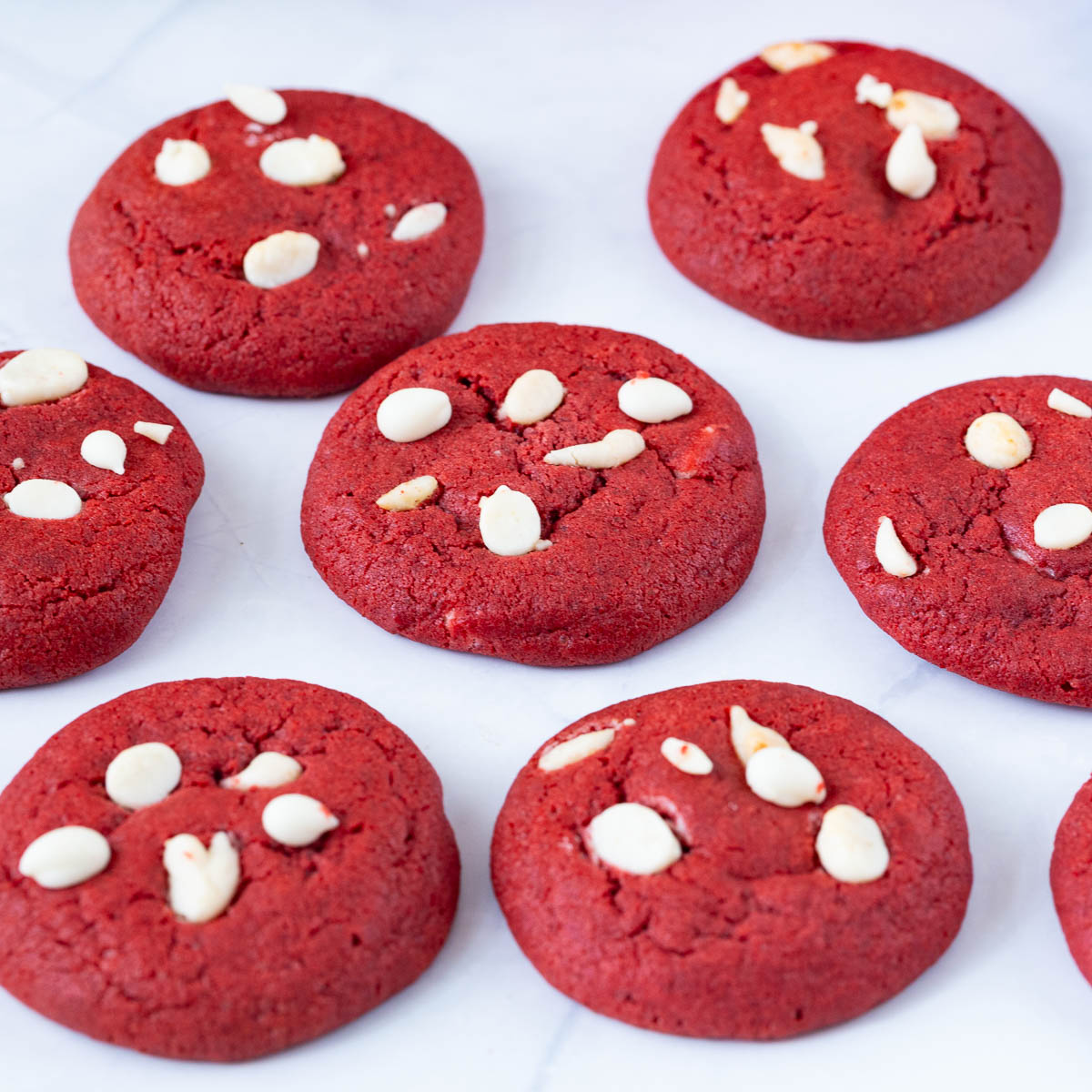 Red velvet sugar cookies on the table.