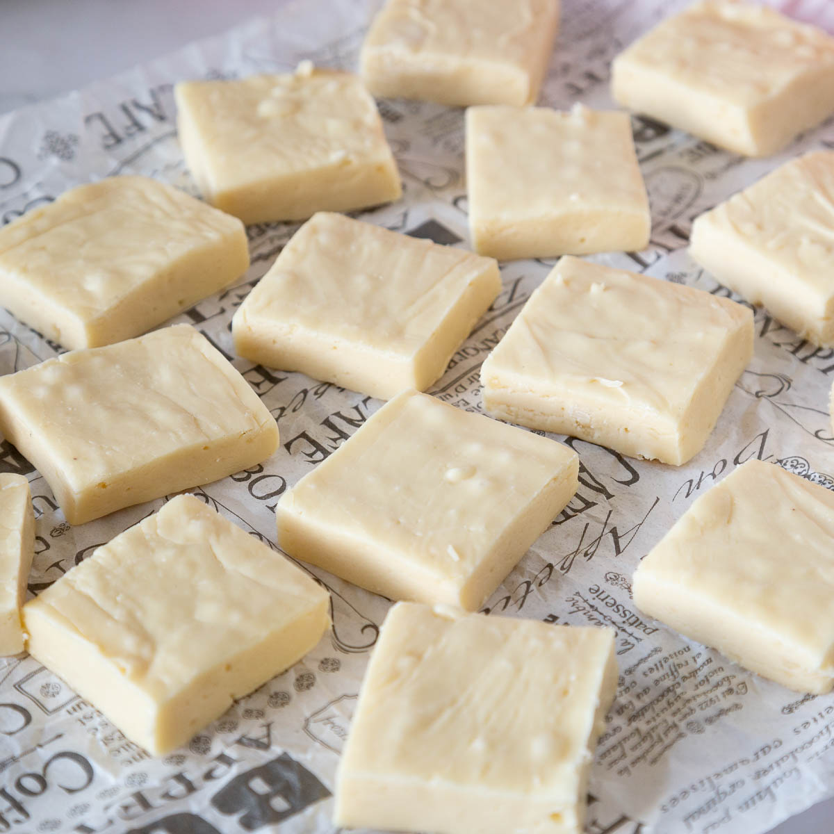Fudge squares on parchment paper.