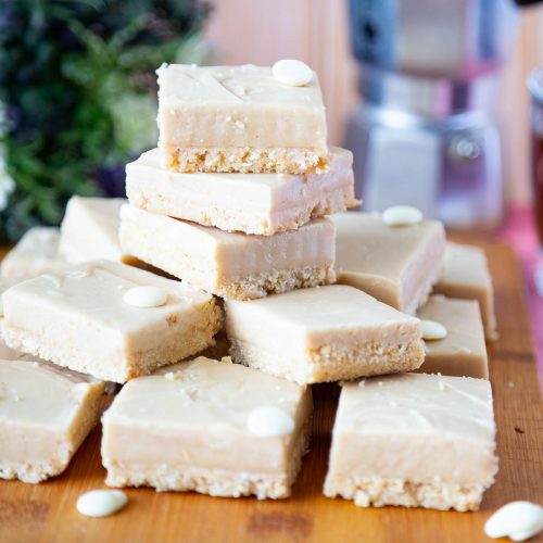 A table with stack of coffee fudge.