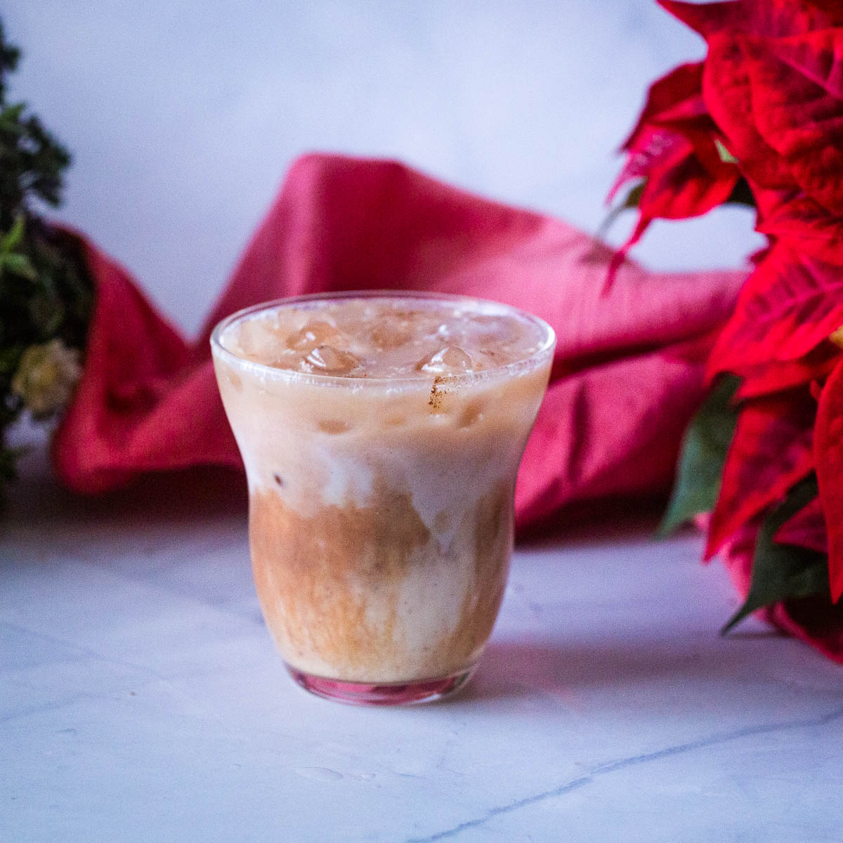 A glass with white Russian cocktail.