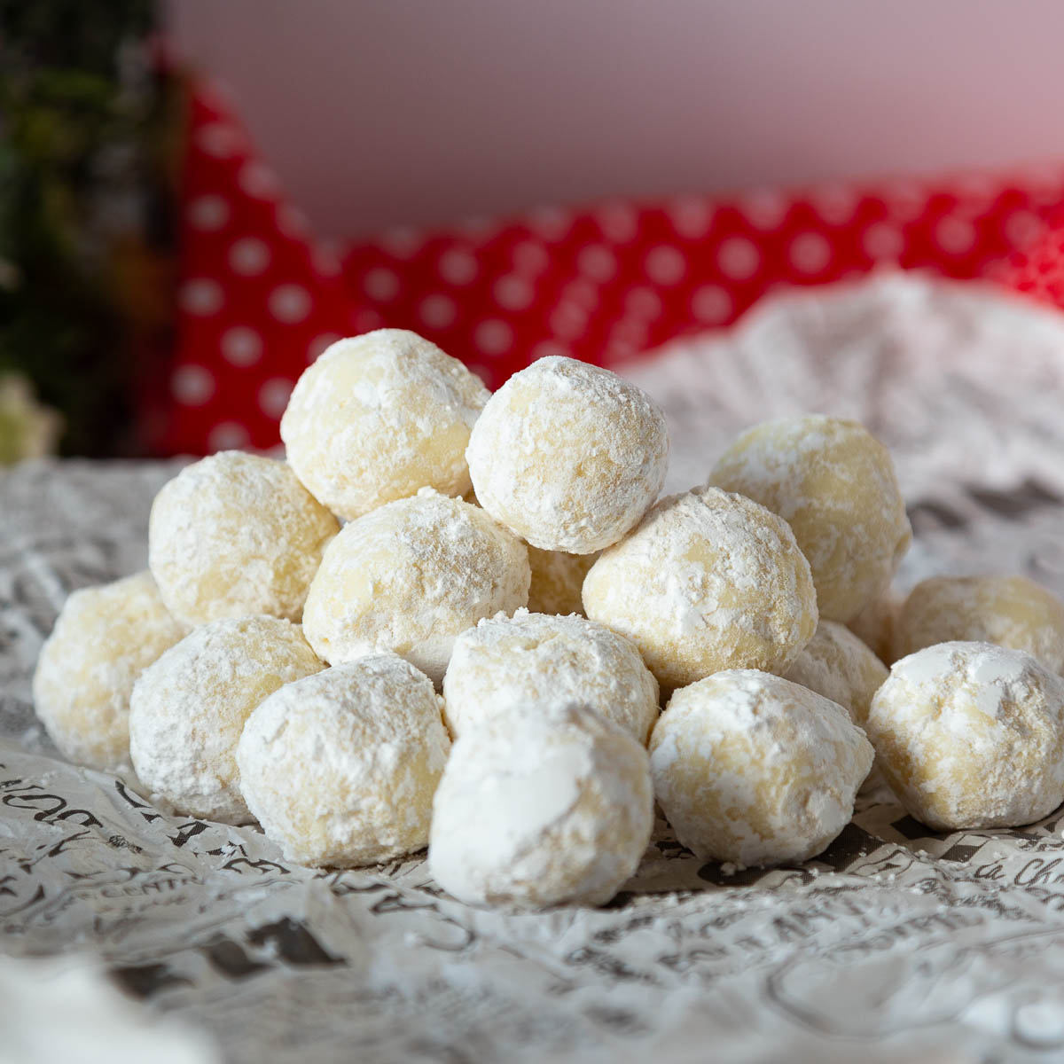 White chocolate truffles on table.