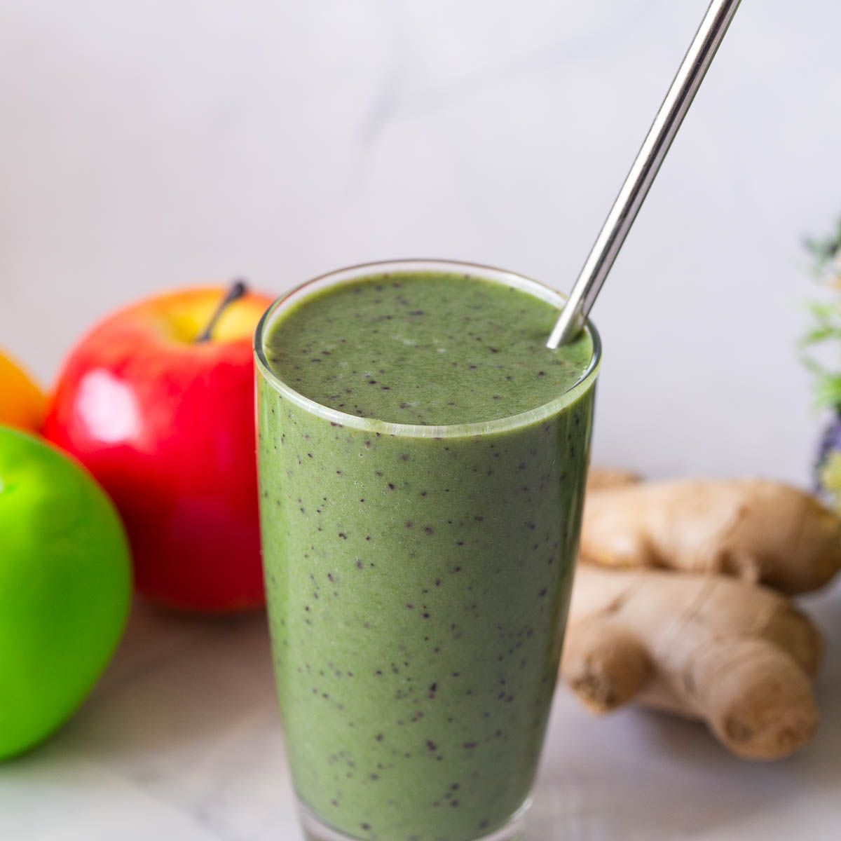 A glass with Green Smoothie.