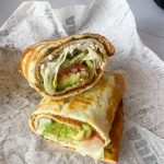 Flatbread wrap on a sandwich board.