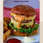 Pinterest image for a double cheeseburger with Fries.