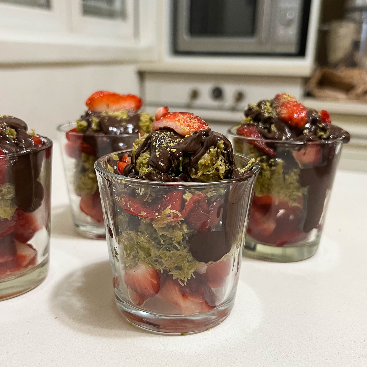 Fresh chocolate strawberry cups on the table.