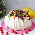 A board with frosted pavlova.