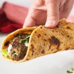 Pinterest image for kofta kebabs with salad and tahini.